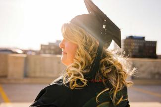 Woman at university graduation.